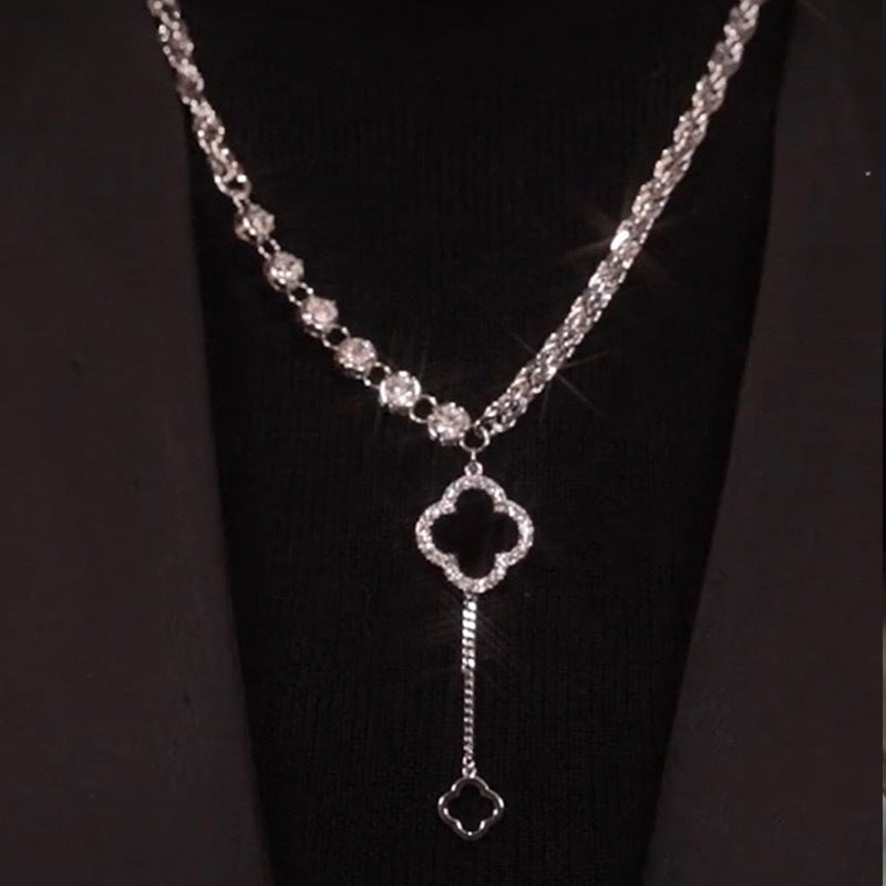 Light Black Four-petal Flower Pendant Necklace Female Niche Design Sweater Chain Flower Necklace Jewelry