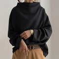 KS | Black sweater with oversized round neckline