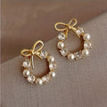 Golden Tie Pearl Earrings