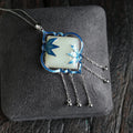 Classic Silver Pendant with Timeless Appeal