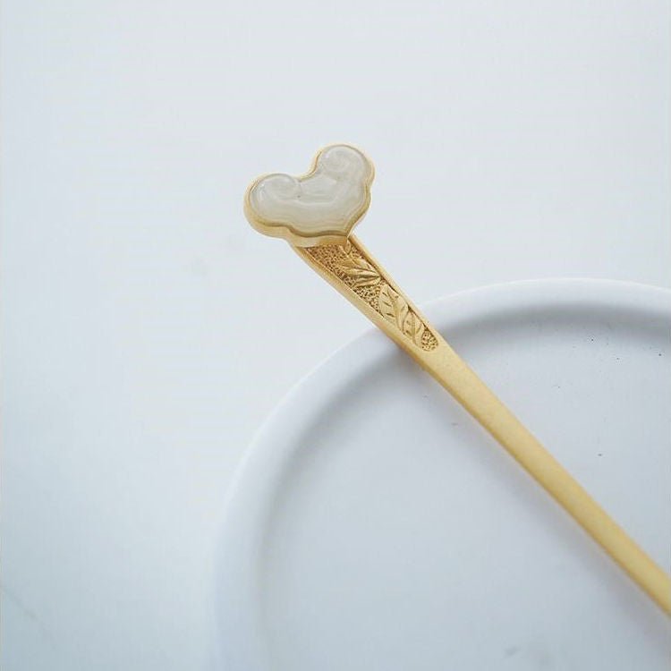 Charming Gold Piece for Any Occasion