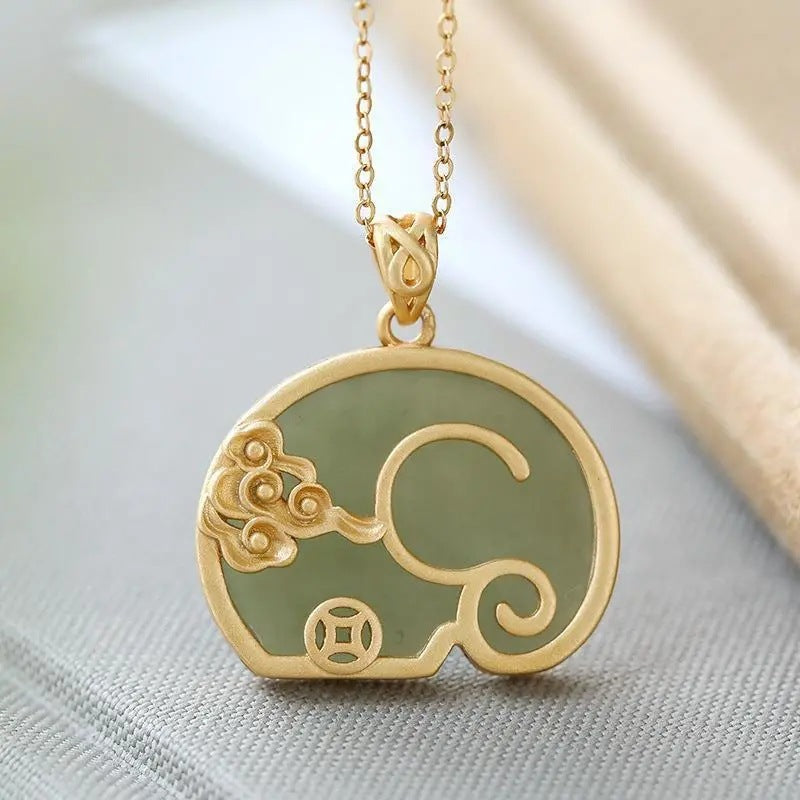 Delicate Artisan Gold Pendant