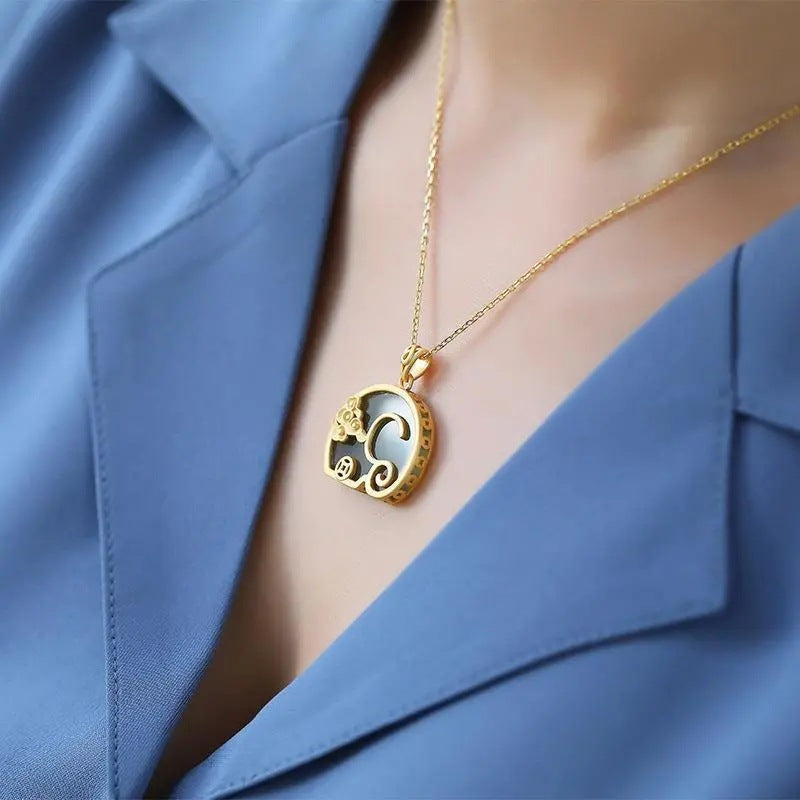 Delicate Artisan Gold Pendant