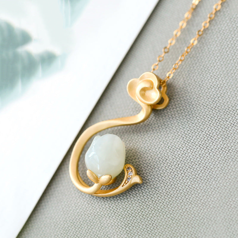 Delicate Artisan Gold Pendant