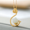 Delicate Artisan Gold Pendant