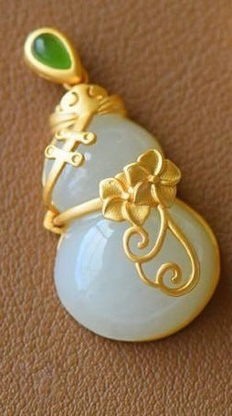 Delicate Artisan Gold Pendant