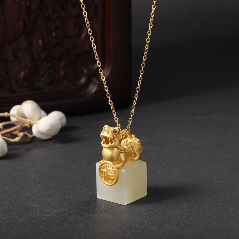 Delicate Artisan Gold Pendant