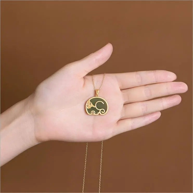 Delicate Artisan Gold Pendant