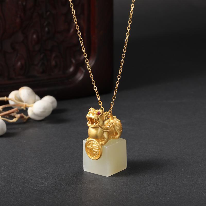 Delicate Artisan Gold Pendant
