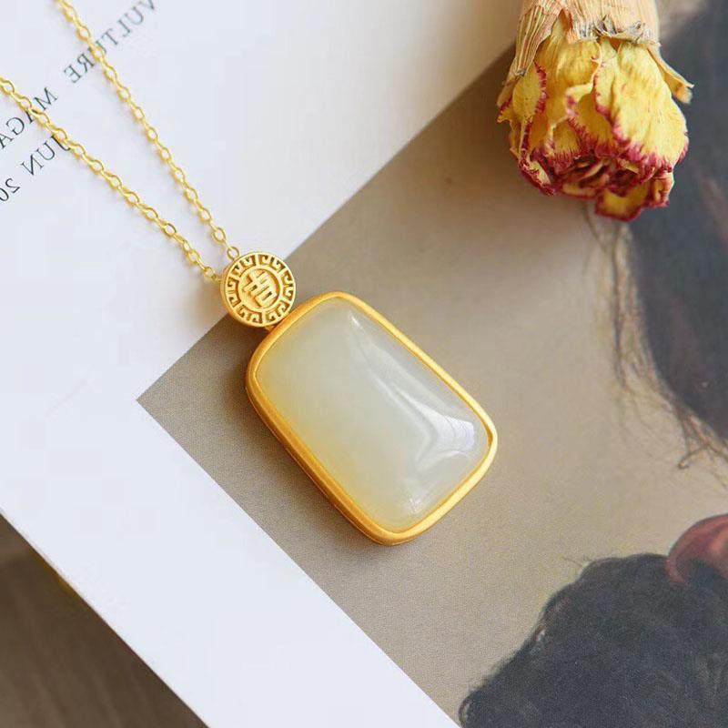 Delicate Artisan Gold Pendant