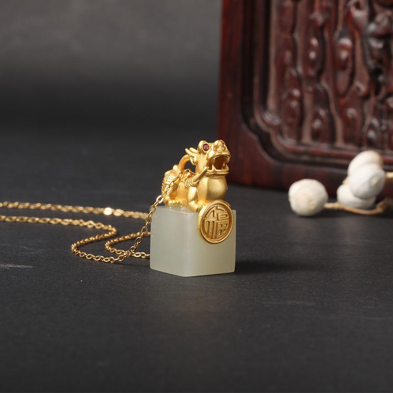 Delicate Artisan Gold Pendant