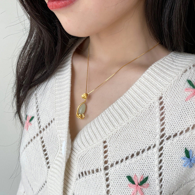 Delicate Artisan Gold Pendant